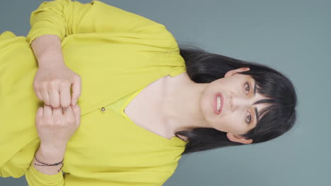 Vertical-video-of-Woman-getting-angry-at-camera.